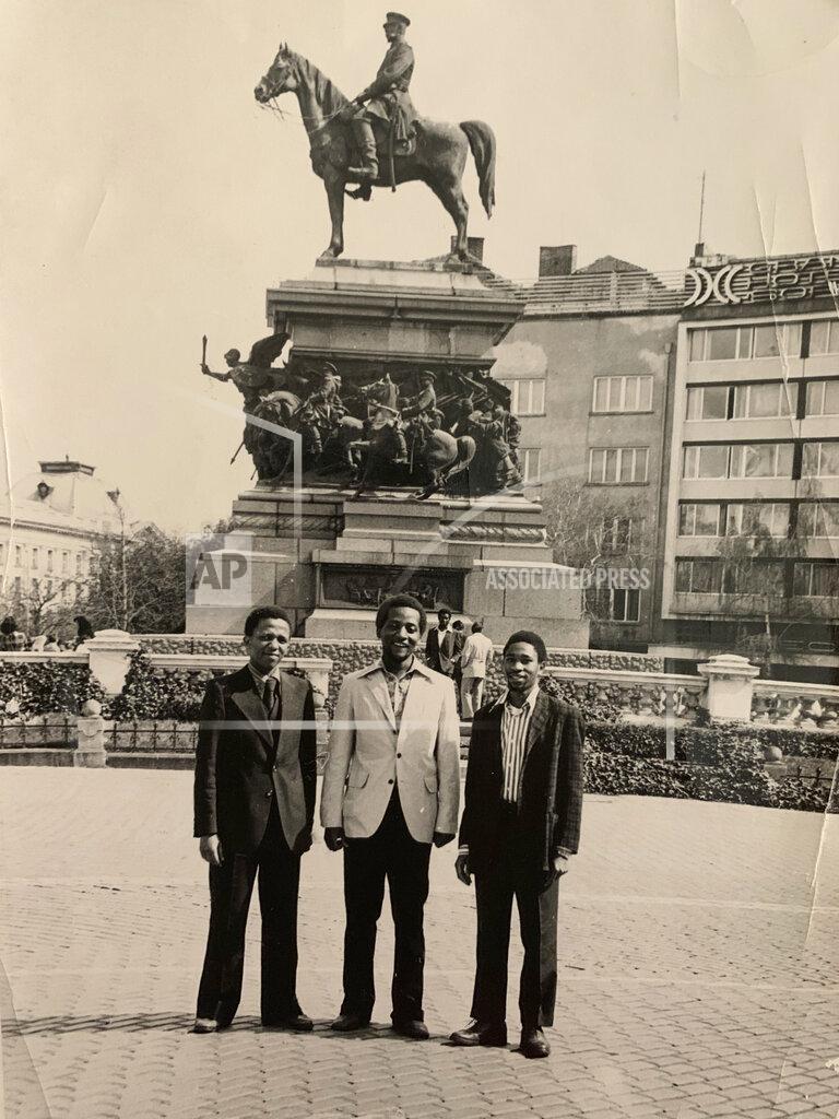 Uncredited In this photo supplied courtesy of the Mini family, the late South African doctor and activist Dr. Clarence Mini is photographed while in exile in Bulgaria with fellow activists. Clarence Mini, a South African activist and doctor who died of COVID-19 spent his life fighting apartheid, the government's denial of HIV/AIDS and rampant corruption. Loved ones say Mini knew the odds were against him but he was committed to what he believed was right. He died in May, 2020, at age 69. (Photo supplied by the Mini family via AP)