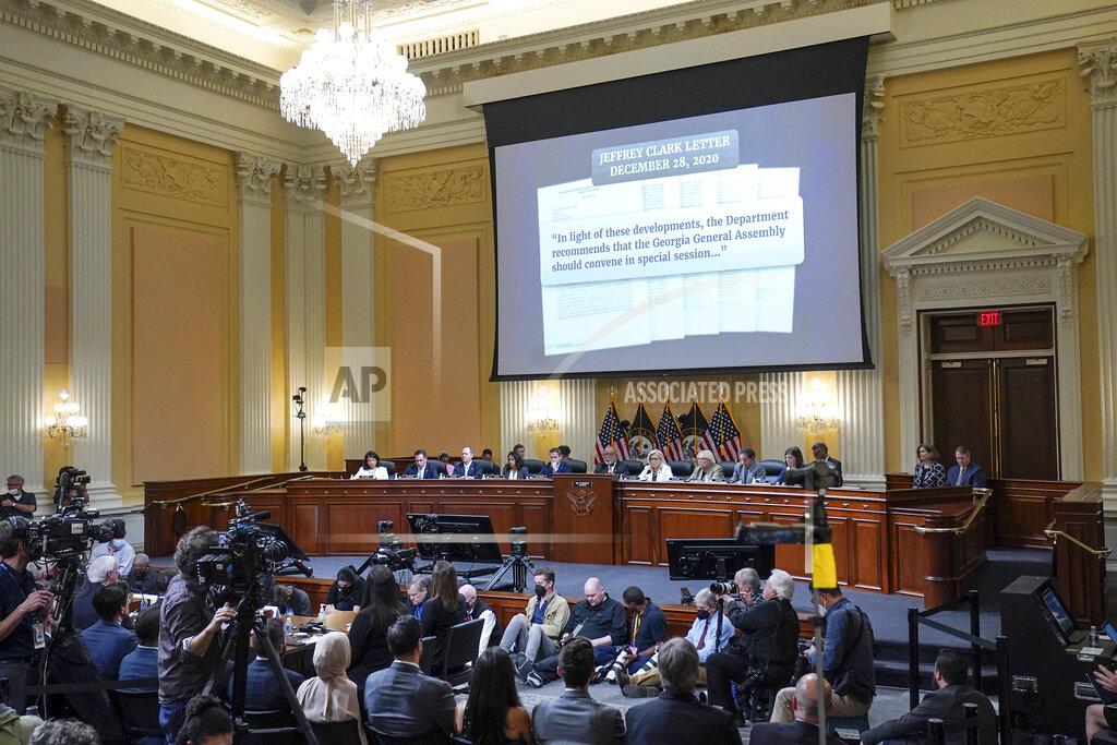 Demetrius Freeman A letter from former Justice Department official Jeffrey Clark is shown on a screen, as the House select committee investigating the Jan. 6 attack on the U.S. Capitol continues to reveal its findings of a year-long investigation, Friday, June 23, 2022, at the Capitol in Washington. (Demetrius Freeman/The Washington Post via AP, Pool)