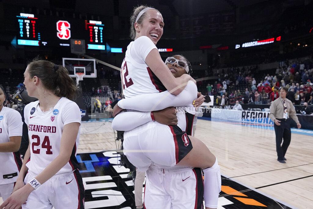 Ted S. Warren Stanford guard Lexie Hull (12) and forward Francesca Belibi, right, react after a college basketball game against Maryland in the Sweet 16 round of the NCAA tournament, Friday, March 25, 2022, in Spokane, Wash. Stanford won 72-66. (AP Photo/Ted S. Warren)