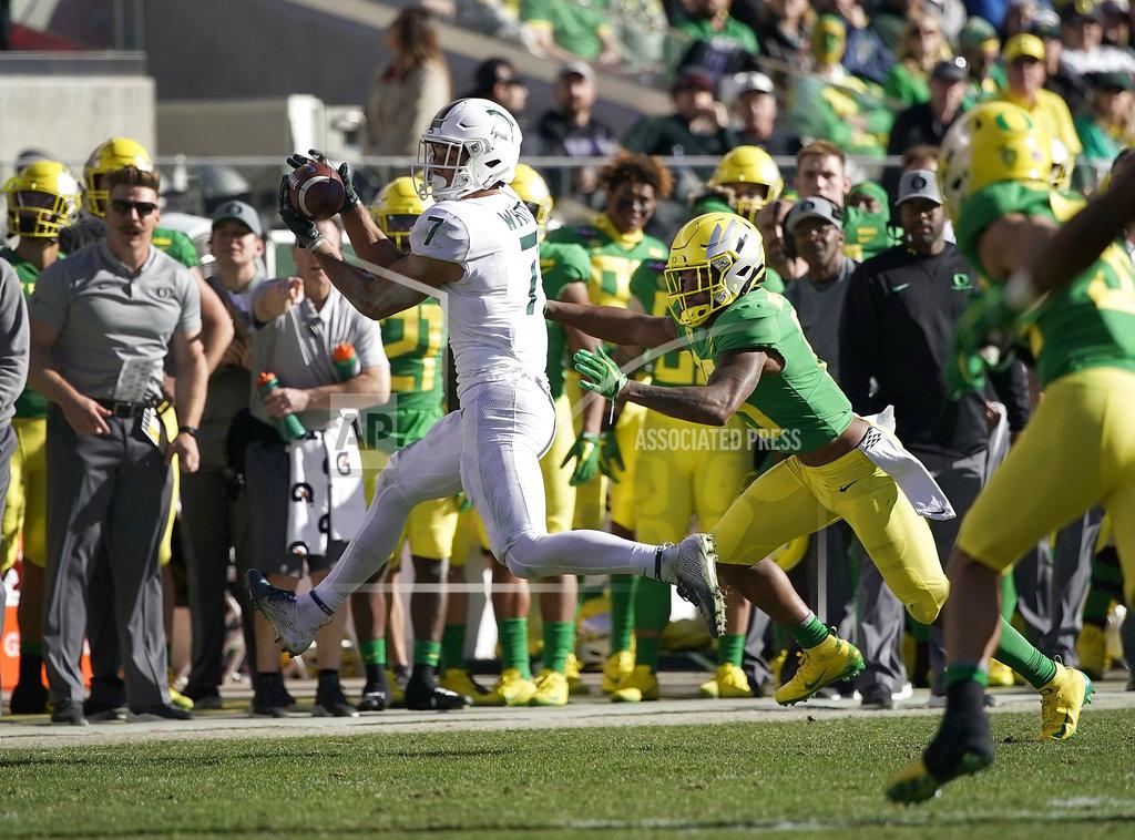 Tony Avelar Michigan State wide receiver Cody White (7) catches a pass in front of Oregon cornerback Deommodore Lenoir (15) during the first half of the Redbox Bowl NCAA college football game Monday, Dec. 31, 2018, in Santa Clara, Calif. (AP Photo/Tony Avelar)