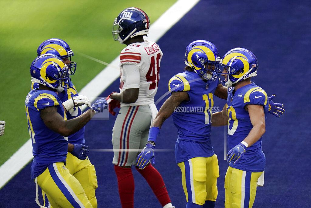 Jae C. Hong Los Angeles Rams wide receiver Cooper Kupp, right, celebrates his touchdown catch with Josh Reynolds (11) during the second half of an NFL football game Sunday, Oct. 4, 2020, in Inglewood, Calif. (AP Photo/Jae C. Hong)