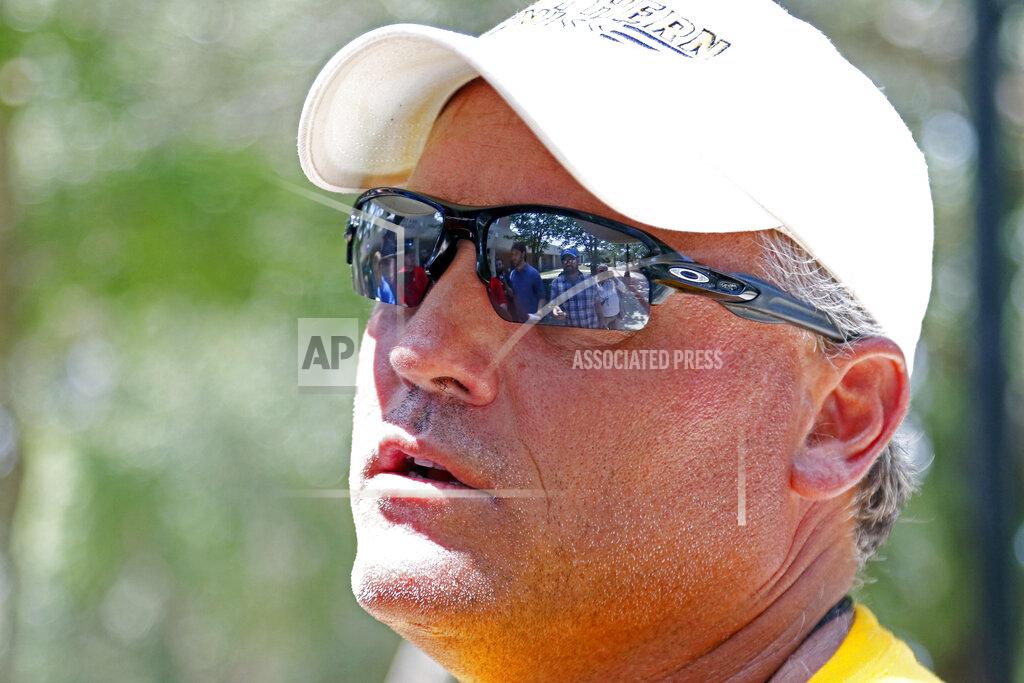 FILE - In this Aug. 15, 2018, file photo, Southern Mississippi coach Jay Hopson speaks with reporters following NCAA college football practice in Hattiesburg, Miss. Southern Mississippi has decided not to hire Art Briles after interviewing the former Baylor football coach, a decision Golden Eagles coach Jay Hopson disagrees with. The school released a statement Wednesday, Feb. 6, 2019, from President Rodney D. Bennett and interim athletics director Jeff Mitchell saying “following that meeting (with Briles), we informed him that he is not a candidate.”(AP Photo/Rogelio V. Solis, File)