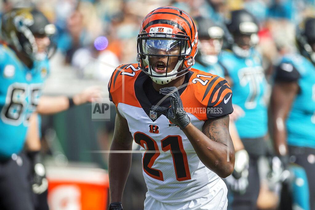 Stephen B. Morton FILE - In this Nov. 5, 2017, file photo, Cincinnati Bengals cornerback Darqueze Dennard (21) calls a formation to the defensive backs during the first half of an NFL football game against the Jacksonville Jaguars in Jacksonville, Fla. The Jacksonville Jaguars and Dennard have parted ways nine days after agreeing to a three-year, $13.5 million contract in free agency. The Jaguars said Thursday, March 26, 2020, “the two sides could not come to an agreement on the final contract terms. (AP Photo/Stephen B. Morton, File)