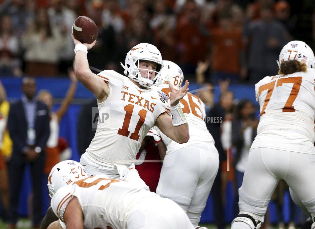 Rusty Costanza Texas quarterback Sam Ehlinger (11) throws a pass during the first half of the Sugar Bowl NCAA college football game against Georgia in New Orleans, Tuesday, Jan. 1, 2019. (AP Photo/Rusty Costanza)