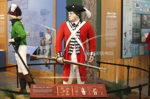 A exhibit of a British soldier is displayed at the Revolutionary War Visitor Center, Friday, Sept. 24, 2021, in Camden, S.C. The center was opened this year to capitalize on the upcoming 250th anniversary of the war as South Carolina promises to tell the full story of its role from the Founding Fathers to slavery. (AP Photo/Jeffrey Collins)