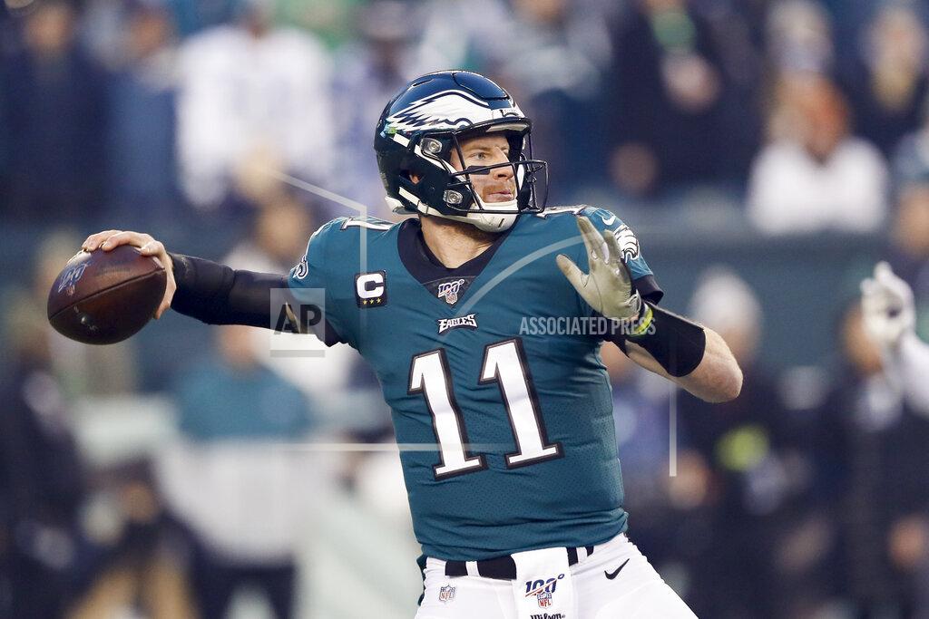 Michael Perez Philadelphia Eagles quarterback Carson Wentz throws a pass during the first half of an NFL football game against the Dallas Cowboys Sunday, Dec. 22, 2019, in Philadelphia. (AP Photo/Michael Perez)