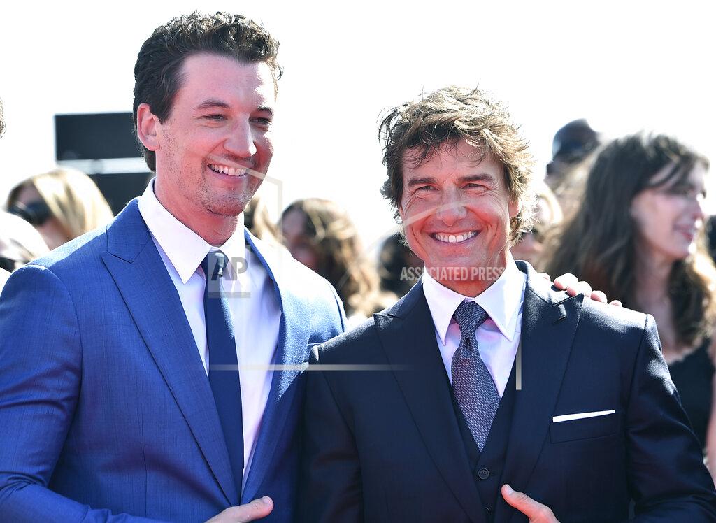 Jordan Strauss Miles Teller, left, and Tom Cruise arrive at the world premiere of "Top Gun: Maverick" on Wednesday, May 4, 2022, at the USS Midway in San Diego. (Photo by Jordan Strauss/Invision/AP)