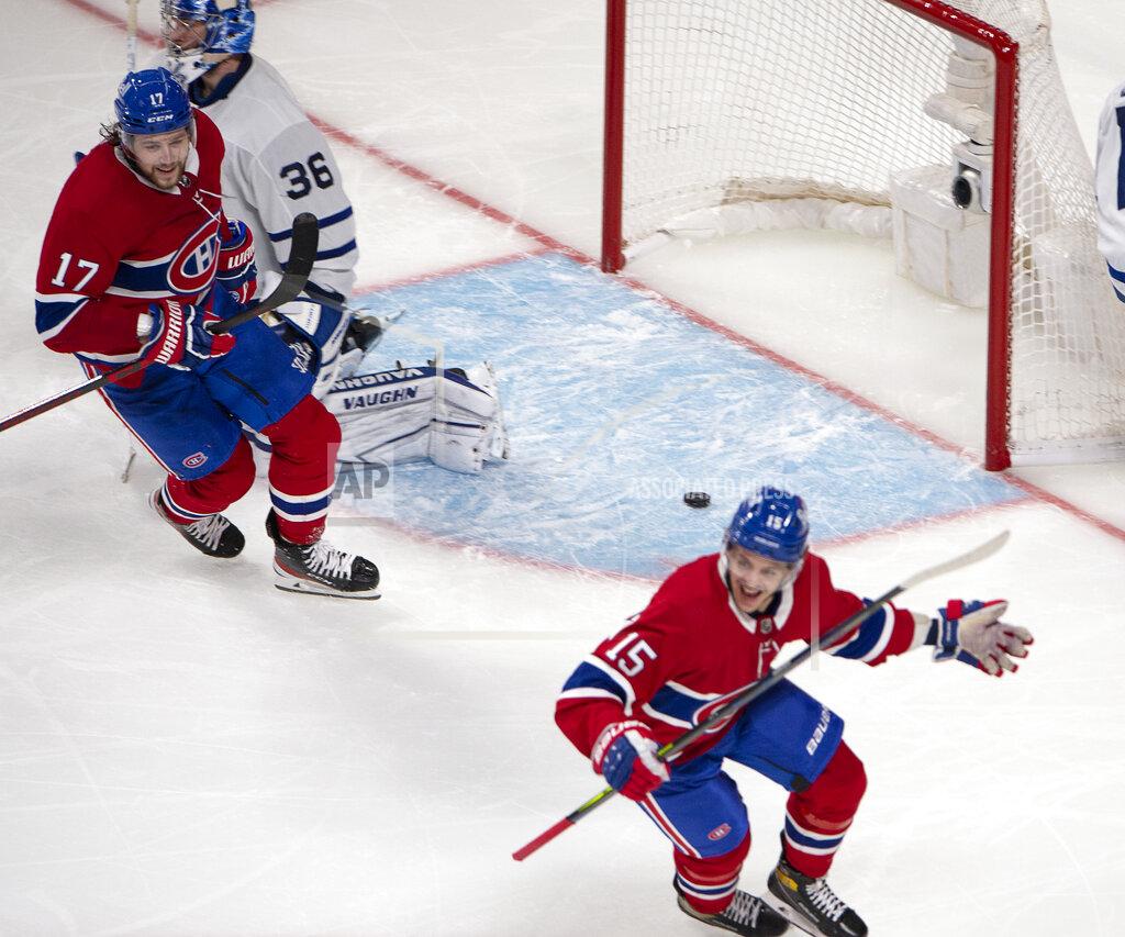 Ryan Remiorz Montreal Canadiens' Jesperi Kotkaniemi (15) reacts after scoring in overtime on Toronto Maple Leafs goaltender Jack Campbell (36) in Game 6 of an NHL hockey Stanley Cup first-round playoff seres Saturday, May 29, 2021, in Montreal. (Ryan Remiorz/The Canadian Press via AP)