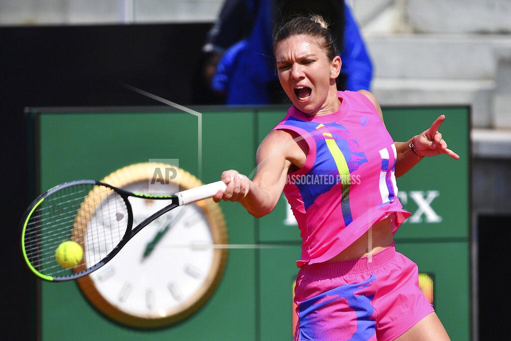 Alfredo Falcone Romania's Simona Halep returns the ball to Italy's Jasmine Paolini during their match at the Italian Open tennis tournament in Rome, Wednesday, Sept. 16, 2020. (Alfredo Falcone/LaPresse via AP)