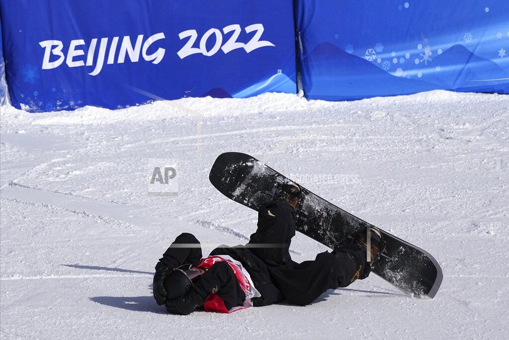 China's Su Yiming reacts as he competes during men's slopestyle finals at the 2022 Winter Olympics, Monday, Feb. 7, 2022, in Zhangjiakou, China. (AP Photo/Gregory Bull)