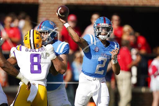 Mississippi quarterback Matt Corral (2) throws a pass against LSU in the first half of an NCAA college football game in Oxford, Miss., Saturday, Oct. 23, 2021. Mississippi won 31-17. (AP Photo/Rogelio V. Solis)