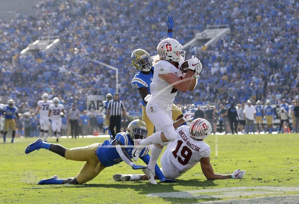 Marcio Jose Sanchez Stanford wide receiver Trenton Irwin, center, catches a pass for a touchdown against UCLA during the first half of an NCAA college football game Saturday, Nov. 24, 2018, in Pasadena, Calif. (AP Photo/Marcio Jose Sanchez)
