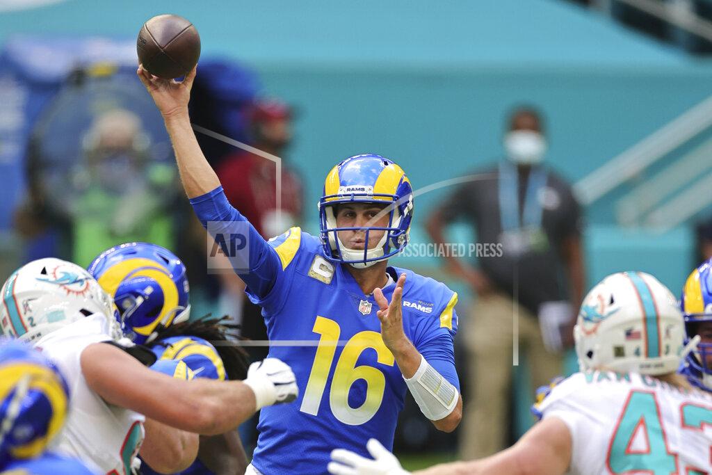 Margaret Bowles Los Angeles Rams quarterback Jared Goff (16) throws the ball over the Miami Dolphin defenders in an NFL game, Sunday, Nov. 1, 2020 in Miami Gardens, Fla. The Dolphins defeated the Rams 28-17. (Margaret Bowles via AP)