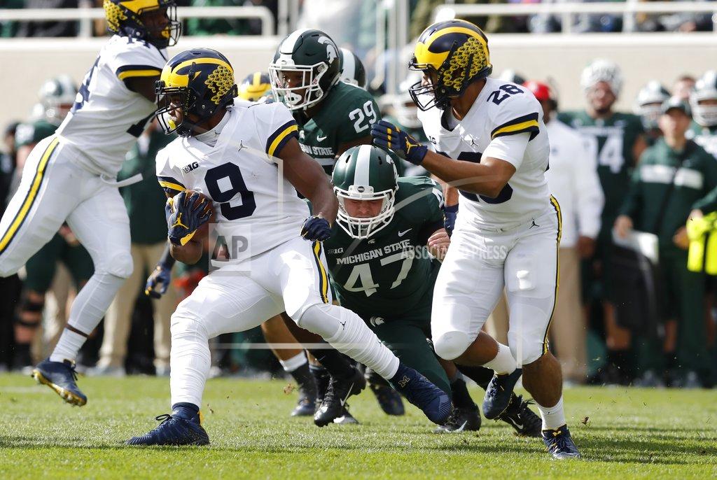 Carlos Osorio Michigan wide receiver Ronnie Bell (8) pulls away from Michigan State's Ryan Armour (47) during the first half of an NCAA college football game, Saturday, Oct. 20, 2018, in East Lansing, Mich. (AP Photo/Carlos Osorio)
