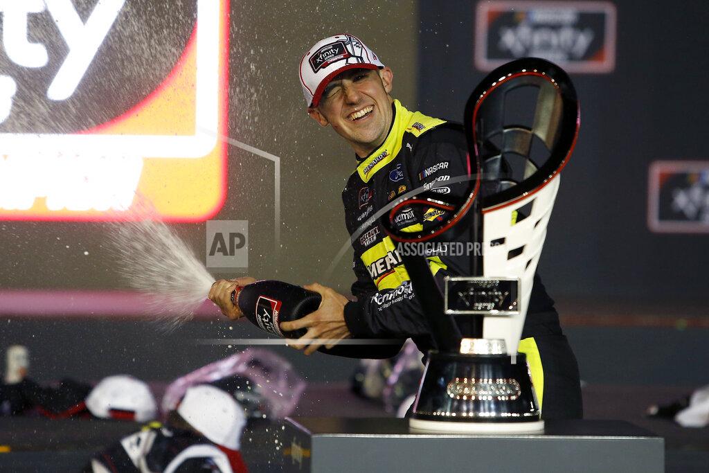 Ralph Freso Austin Cindric celebrates in Victory Lane after winning the season championship and the NASCAR Xfinity Series auto race at Phoenix Raceway, Saturday, Nov. 7, 2020, in Avondale, Ariz. (AP Photo/Ralph Freso)