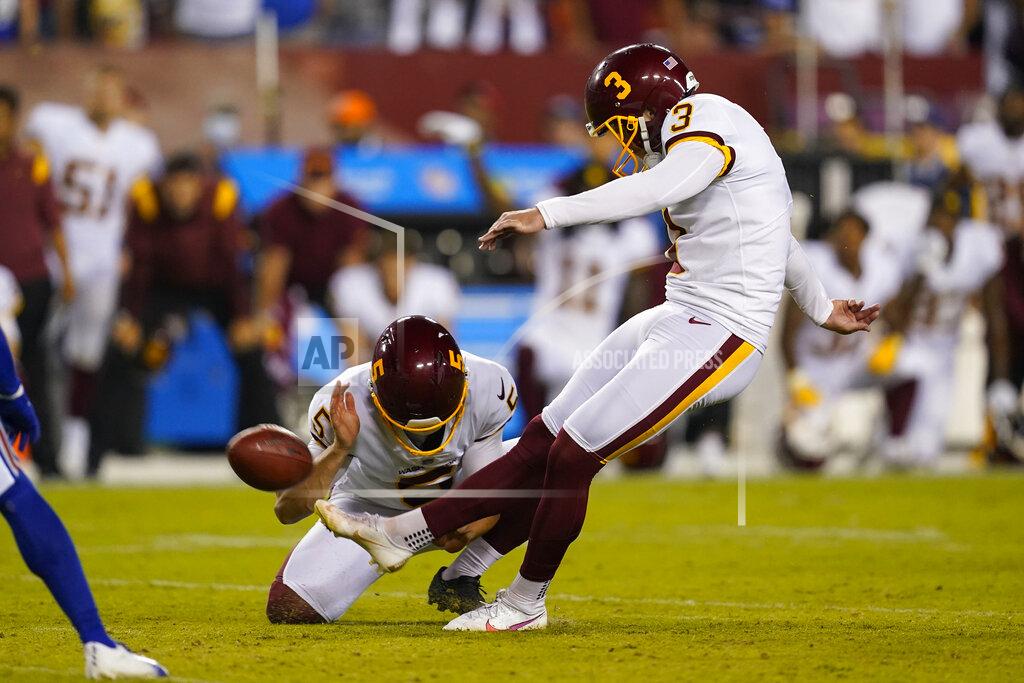 Alex Brandon Washington Football Team kicker Dustin Hopkins (3) makes the winning field goal against the New York Giants in second half of an NFL football game, Thursday, Sept. 16, 2021, in Landover, Md. Washington won 30 - 29. (AP Photo/Alex Brandon)
