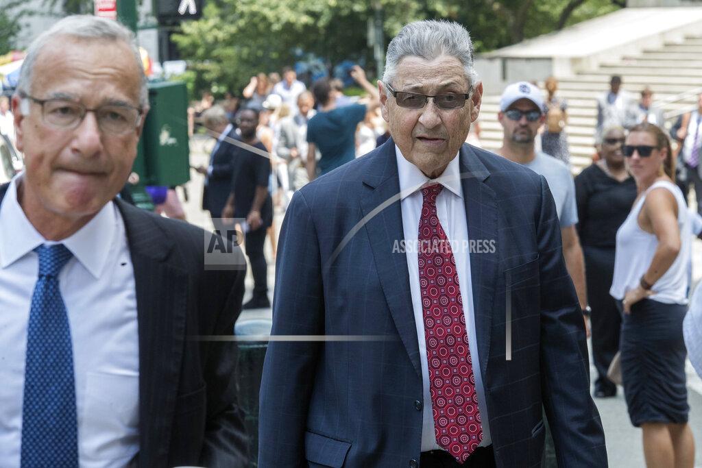Mary Altaffer FILE- In this July 27, 2018 file photo, former New York Assembly Speaker Sheldon Silver, right, arrives at federal court in New York. Silver has been sentenced to 6 1/2 years in prison. The sentencing Monday, Aug. 24, 2020 by U.S. District Judge Valerie Caproni came after she insisted that the 76-year-old Democrat come to court rather than appear remotely. In a handwritten letter to the judge, Silver had asked that he be spared a prison term that would cause him to die in prison. (AP Photo/Mary Altaffer, File)
