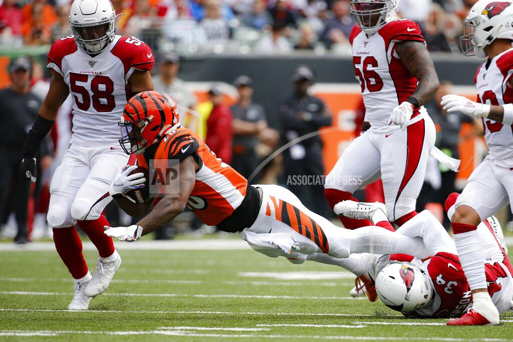 Frank Victores Cincinnati Bengals running back Joe Mixon (28) is tackled by Arizona Cardinals defensive back Jalen Thompson (34) in the first half of an NFL football game, Sunday, Oct. 6, 2019, in Cincinnati. (AP Photo/Frank Victores)