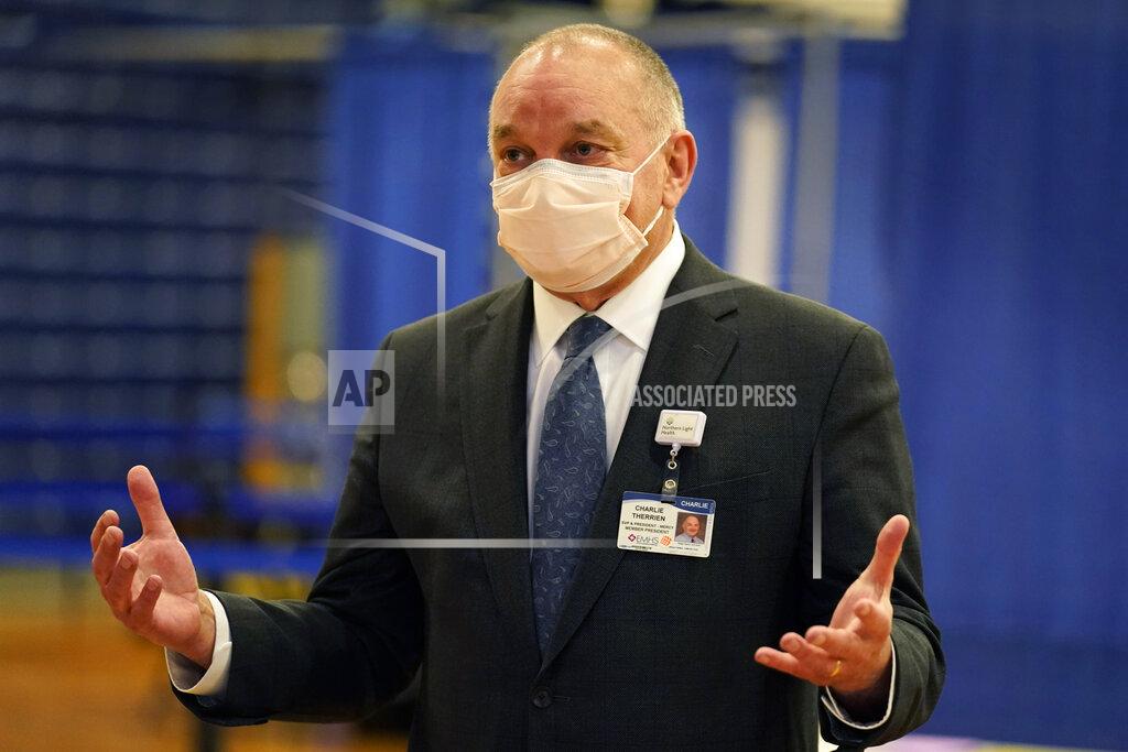 Robert F. Bukaty Mercy Hospital president Charlie Therrien speaks to reporters a day ahead of the launching of a new community COVID-19 vaccination clinic at the Portland Expo, Monday, March 1, 2021, in Portland, Maine. (AP Photo/Robert F. Bukaty)