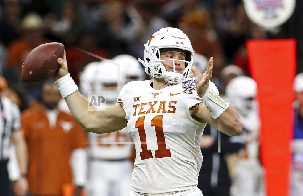 Rusty Costanza Texas quarterback Sam Ehlinger (11) throws a pass during the first half of the team's Sugar Bowl NCAA college football game against Georgia in New Orleans, Tuesday, Jan. 1, 2019. (AP Photo/Rusty Costanza)