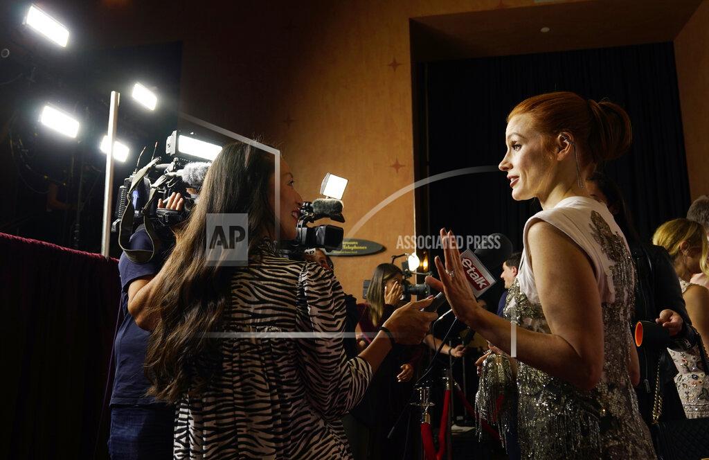 Chris Pizzello Jessica Chastain, star of "The Eyes of Tammy Faye," works the press line at the premiere of the film at the 2021 Toronto International Film Festival, Sunday, Sept. 12, 2021, in Toronto. (AP Photo/Chris Pizzello)