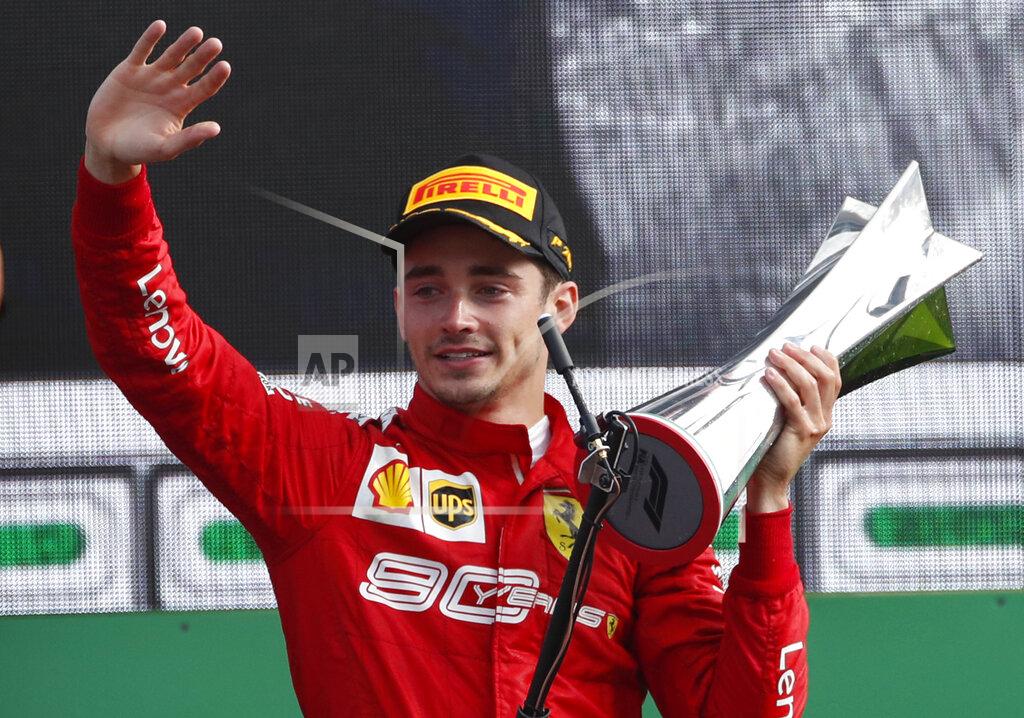 Antonio Calanni Ferrari driver Charles Leclerc of Monaco celebrates on podium after winning the Formula One Italy Grand Prix at the Monza racetrack, in Monza, Italy, Sunday, Sept.8, 2019. (AP Photo/Antonio Calanni)