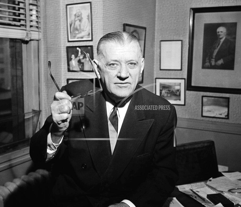 Warren M. Winterbottom FILE - In this Feb. 13, 1957, file photo, NFL Commissioner Bert Bell gestures in his office in Philadelphia. His creation, the NFL draft, has become an industry unto itself and the league's third-most popular annual event behind the Super Bowl and opening weekend. (AP Photo/Warren M. Winterbottom, File)