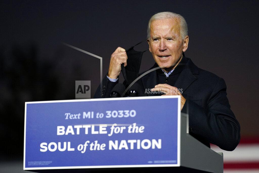 Andrew Harnik Democratic presidential candidate former Vice President Joe Biden arrives to speak at a rally at Belle Isle Casino in Detroit, Mich., Saturday, Oct. 31, 2020, which former President Barack Obama also attended. (AP Photo/Andrew Harnik)