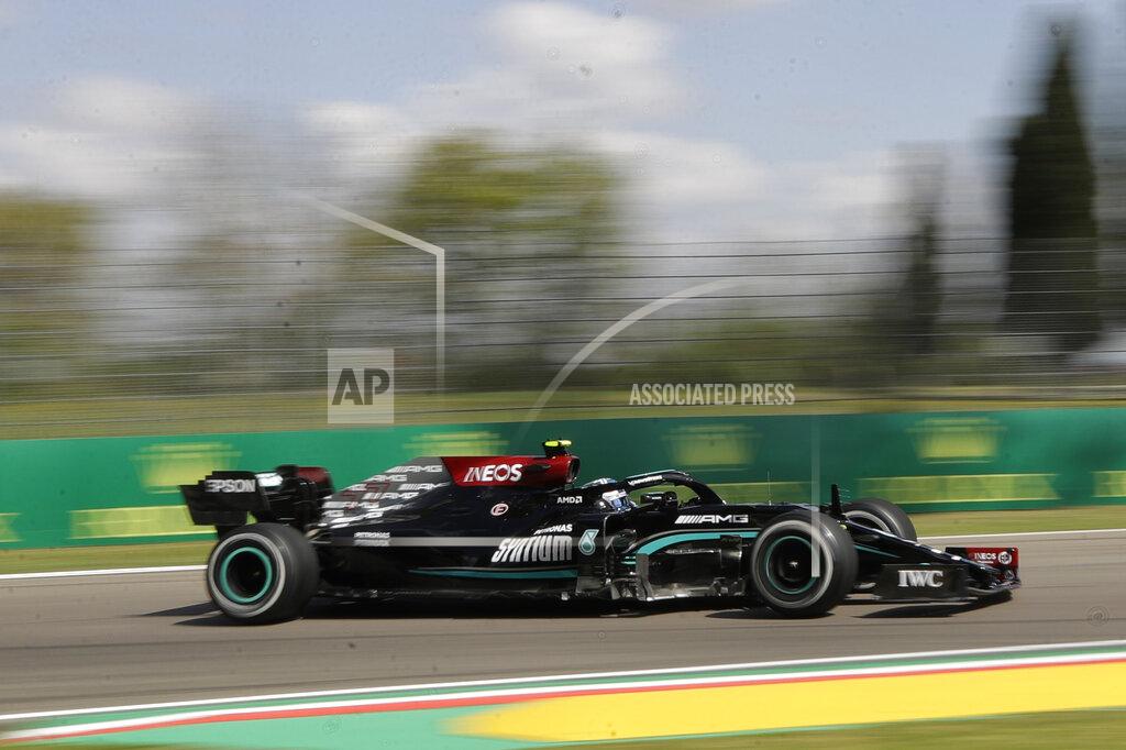 Luca Bruno Mercedes driver Valtteri Bottas of Finland steers his car during free practice for Sunday's Emilia Romagna Formula One Grand Prix, at the Imola track, Italy, Friday, April 16, 2021. (AP Photo/Luca Bruno)