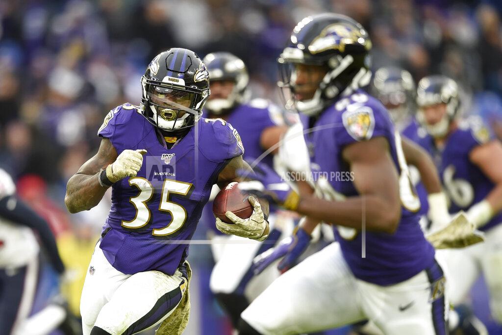 Gail Burton Baltimore Ravens running back Gus Edwards runs for a touchdown against the Houston Texans during the second half of an NFL football game, Sunday, Nov. 17, 2019, in Baltimore. (AP Photo/Gail Burton)