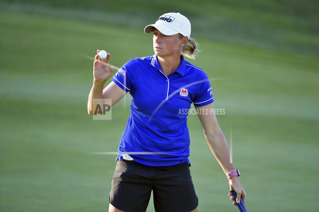 Michael Woods Stacy Lewis waves to fans after sinking her putt on the 9th green during the second round of the LPGA Walmart NW Arkansas Championship golf tournament, Saturday, Sept. 25, 2021, in Rogers, Ark. (AP Photo/Michael Woods)