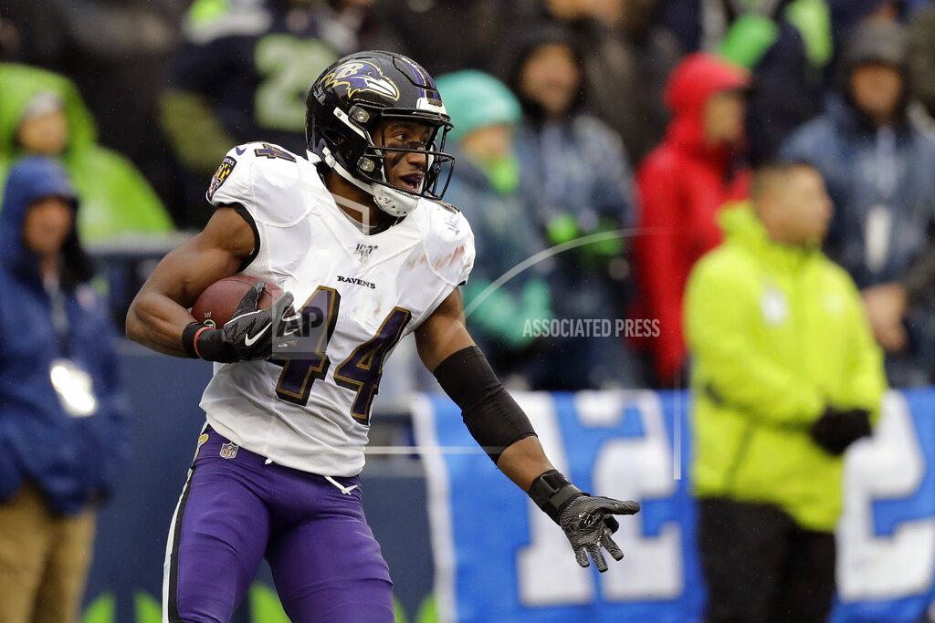 John Froschauer Baltimore Ravens cornerback Marlon Humphrey celebrates after he recovered a fumble and ran for a touchdown during the second half of an NFL football game against the Seattle Seahawks, Sunday, Oct. 20, 2019, in Seattle. (AP Photo/John Froschauer)
