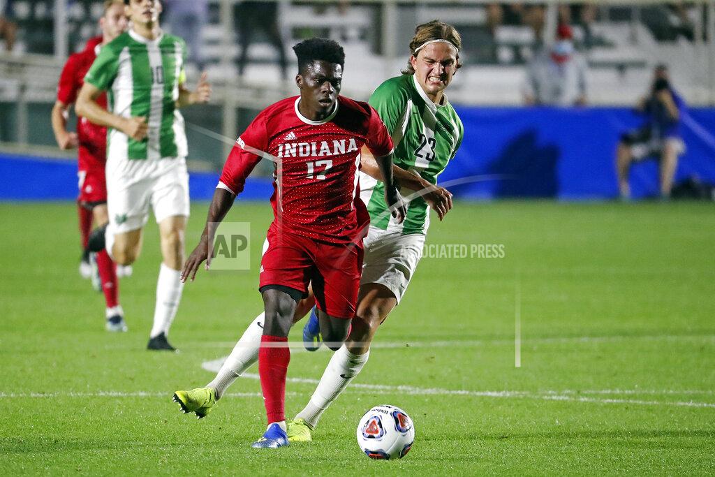 Karl B Deblaker Indiana's Herbert Endeley (17) tries to break away from Marshall's Max Schneider (23) during the first half of the NCAA College Cup championship soccer match in Cary, N.C., Monday, May 17, 2021. (AP Photo/Karl B DeBlaker)