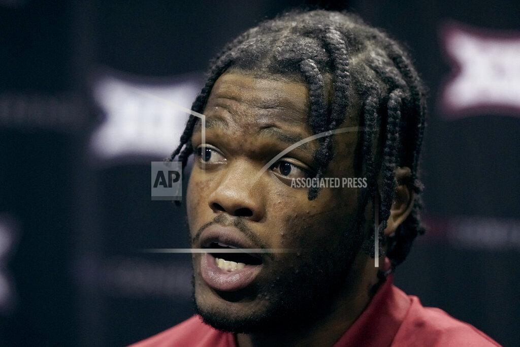Charlie Riedel Oklahoma's Elijah Harkless speaks to the media during Big 12 NCAA college basketball media day Wednesday, Oct. 20, 2021, in Kansas City, Mo. (AP Photo/Charlie Riedel)
