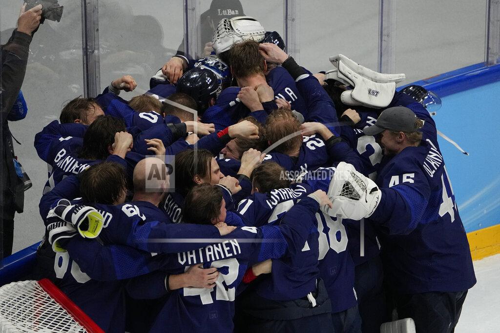 Jae C. Hong Finland celebrates defeating the Russian Olympic Committee in the men's gold medal hockey game at the 2022 Winter Olympics, Sunday, Feb. 20, 2022, in Beijing. (AP Photo/Jae C. Hong)