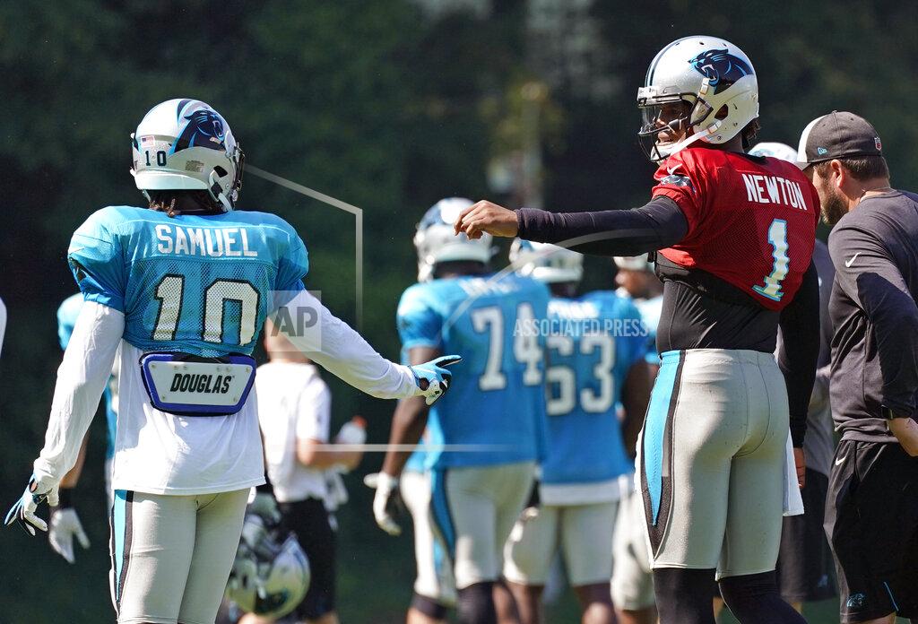 Chuck Burton Carolina Panthers' Cam Newton (1) congratulates Curtis Samuel (10) after a play during practice at the NFL football team's training camp in Spartanburg, S.C., Monday, July 29, 2019. (AP Photo/Chuck Burton)