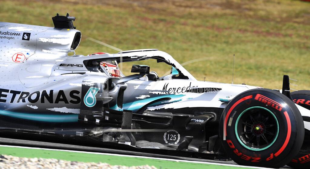 Jens Meyer Mercedes driver Lewis Hamilton of Britain steers his car during the qualifying Formula One session at the Hockenheimring racetrack in Hockenheim, Germany, Saturday, July 27, 2019. The German Formula One Grand Prix will be held on Sunday. (AP Photo/Jens Meyer)