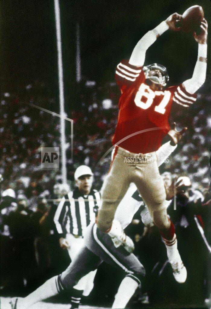Phil Huber FILE - In this Jan. 10, 1982, file photo, San Francisco 49ers wide receiver Dwight Clark makes "The Catch," on a pass from Joe Montana that tied the game late in the fourth quarter against the Dallas Cowboys in the NFC championship football game at Candlestick Park in San Francisco. A pair of Super Bowl winning teams that launched dynasties in San Francisco and New England highlighted the list of the NFL's greatest teams, numbers 31-100. Coming in at No. 31 was the 1981 San Francisco 49ers led by coach Bill Walsh and quarterback Joe Montana. (AP Photo/Dallas Morning News, Phil Huber, File)/The Dallas Morning News via AP)/The Dallas Morning News via AP)