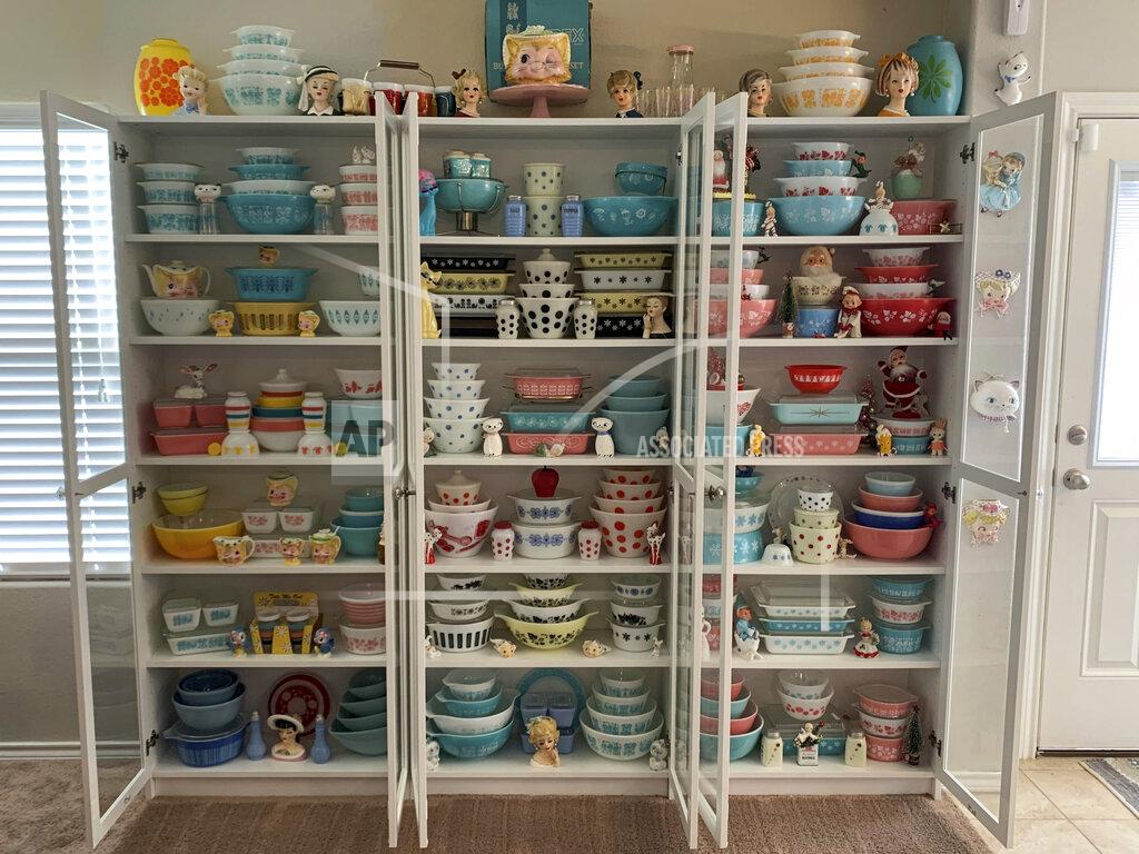 Megan Telfer This image provided by Megan Telfer shows the wide selection of antique Pyrex dishes she displays at her Texas home. Telfer has more than 300 pieces of vintage Pyrex, displayed on three large bookcases. Telfer's 5-year-old daughter has some vintage Pyrex, too. "We don't use 90 percent of it," Telfer said. "I display it." (Megan Telfer via AP)