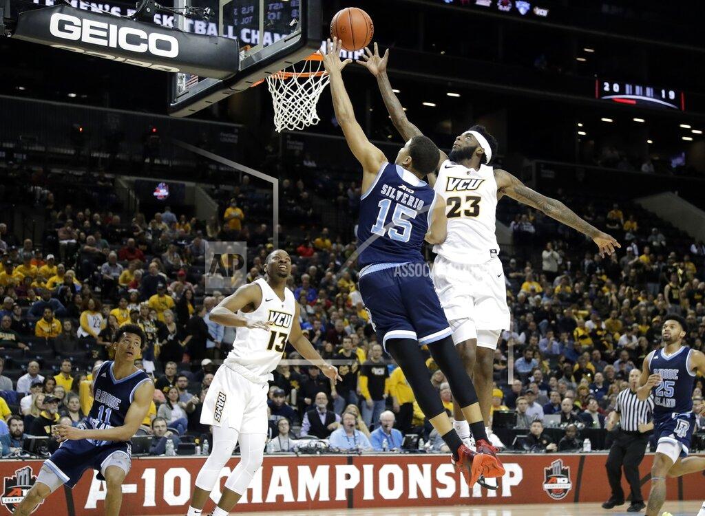 Frank Franklin Ii Rhode Island's Omar Silverio (15) drives past VCU's Issac Vann (23) during the second half of an NCAA college basketball game in the Atlantic 10 men's tournament Friday, March 15, 2019, in New York. Rhode Island won 75-70. (AP Photo/Frank Franklin II)