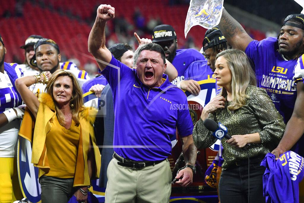 John Amis LSU head coach Ed Orgeron celebrates after the Southeastern Conference championship NCAA college football game against Georgia, Saturday, Dec. 7, 2019, in Atlanta. LSU won 37-10. (AP Photo/John Amis)