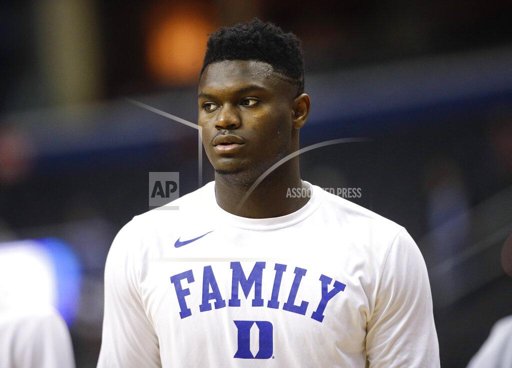 Patrick Semansky FILE - In this March 31, 2019, file photo, Duke forward Zion Williamson warms up before the start of an NCAA men's East Regional final college basketball game against Michigan State, in Washington. The player widely projected to be the NBA draft’s top overall pick came up at a college basketball corruption trial as jurors heard a recording of a Clemson coach who seemed eager for help recruiting him. The charismatic Zion Williamson played one year at Duke before entering the draft scheduled for June. (AP Photo/Patrick Semansky, File)