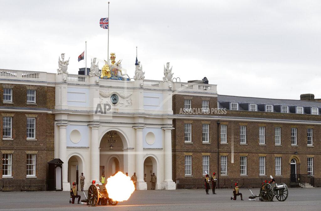 Alastair Grant Soldiers of the Royal Horse Artillery fire a ceremonial gun during the 41 Death Gun salute in memory of Prince Philip at the Royal Artillery barracks in Woolwich, London, Saturday, April 10, 2021. Buckingham Palace officials announced Friday that Prince Philip, the husband of Queen Elizabeth II, has died . He was 99. (AP Photo/Alastair Grant, Pool)