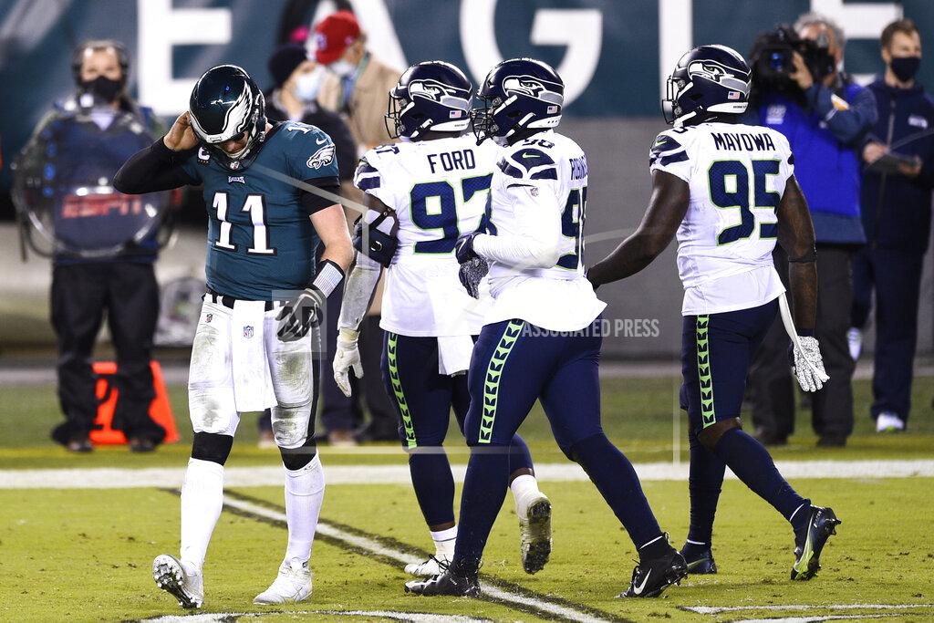 Derik Hamilton Philadelphia Eagles' Carson Wentz walks off the field during the second half of an NFL football game against the Seattle Seahawks, Monday, Nov. 30, 2020, in Philadelphia. (AP Photo/Derik Hamilton)
