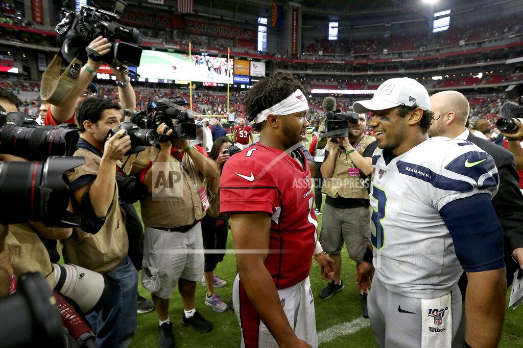 Ross D. Franklin Seattle Seahawks quarterback Russell Wilson (3), right, and Arizona Cardinals quarterback Kyler Murray (1) meet after an NFL football game, Sunday, Sept. 29, 2019, in Glendale, Ariz. The Seahawks won 27-10. (AP Photo/Ross D. Franklin)