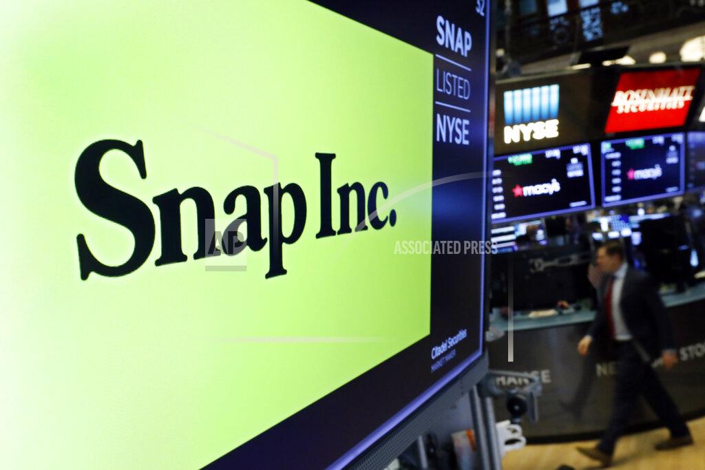 Richard Drew FILE - The logo for Snap Inc. appears above a post on the floor of the New York Stock Exchange, Feb. 5, 2020. Social media companies are having a tough go of it so far in 2022 as Snap issued a profit warning due to current economic conditions. Snap Inc., the parent of Snapchat, disclosed in a regulatory filing on Monday, May 23, 2022 that ever since it provided its outlook for the second quarter last month, “the macroeconomic environment has deteriorated further and faster than anticipated.” (AP Photo/Richard Drew, file)