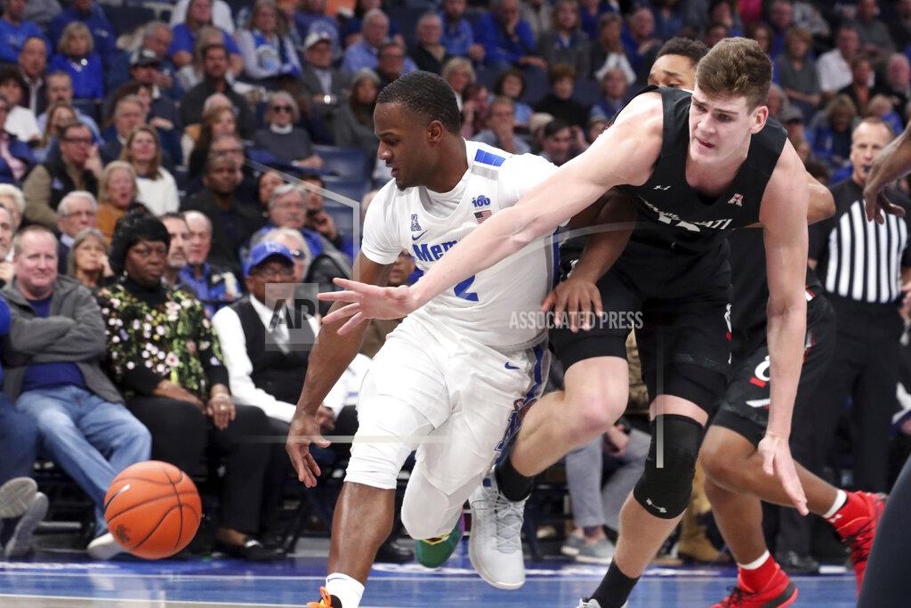Karen Pulfer Focht Memphis' guard Alex Lomax (2) and Cincinnati's center Chris Vogt (33) battle for a loose ball in the second half of an NCAA college basketball game Thursday, Jan. 16, 2020, in Memphis, Tenn. (AP Photo/Karen Pulfer Focht)