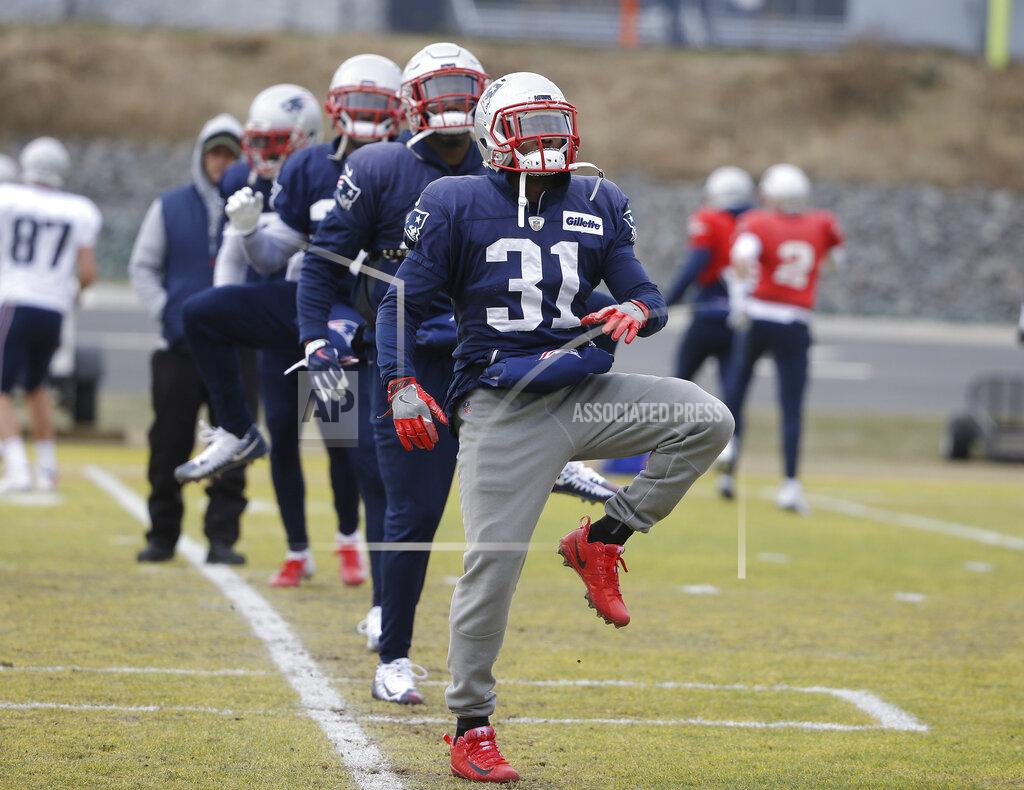 New England Patriots defensive back Jonathan Jones (31) warms up with teammates during an NFL football practice, Wednesday, Jan. 16, 2019, in Foxborough, Mass. The Patriots are scheduled to face the Kansas City Chiefs in the AFC championship game, Sunday, Jan. 20, in Kansas City. (AP Photo/Steven Senne)