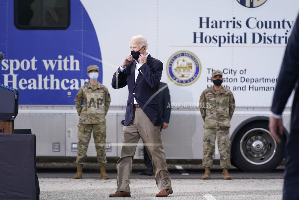 Patrick Semansky President Joe Biden arrives to speak at a FEMA COVID-19 mass vaccination site at NRG Stadium, Friday, Feb. 26, 2021, in Houston. (AP Photo/Patrick Semansky)