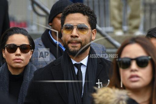 FILE - In this Feb. 24, 2020 file photo, former "Empire" actor Jussie Smollett leaves the Leighton Criminal Courthouse in Chicago. A judge on Friday, Oct. 15, 2021, denied a last-ditch effort to dismiss a criminal case against actor Jussie Smollett, who is accused of lying to police when he reported that two masked men attacked him in downtown Chicago. (AP Photo/Matt Marton, File)